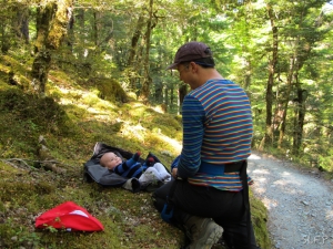 Diaper change and play time in the NZ bush along the Routeburn Track